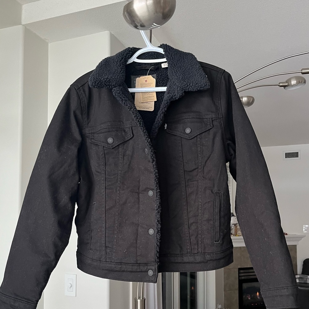 LEVI’s Sherpa Denim Black Trucker Jacket